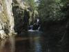 Sun shining down on the third drop and pool
