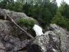 Steep rock formations around the falls
