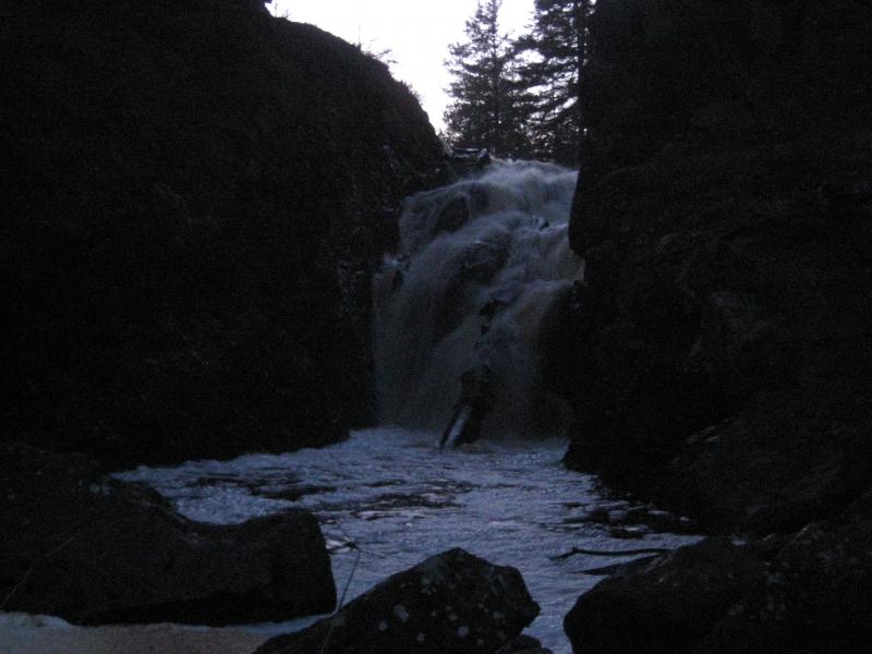 Dark, foaming waters