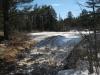 Foamy pond below the falls