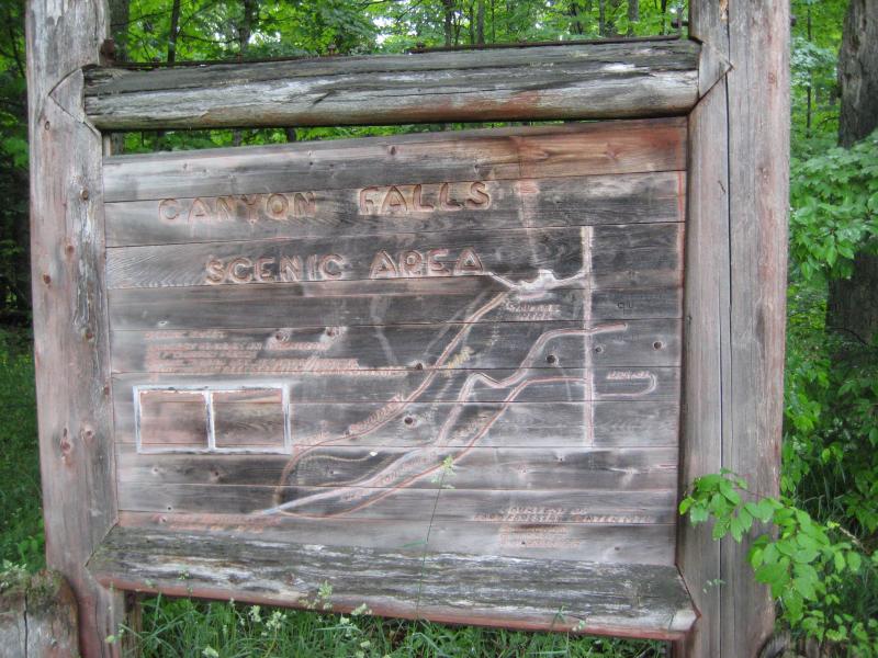 Old park sign in the woods