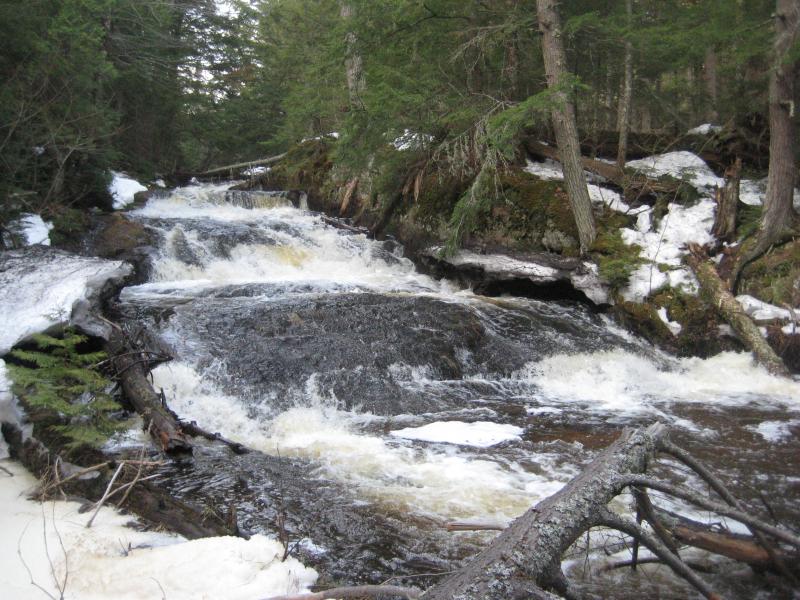Large fanning drop between the snowy banks