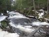 Large fanning drop between the snowy banks