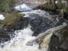 Smooth waters dropping over smooth rocks