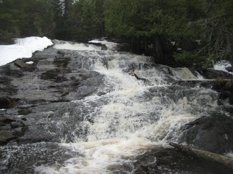 Water falling down the dark rocks
