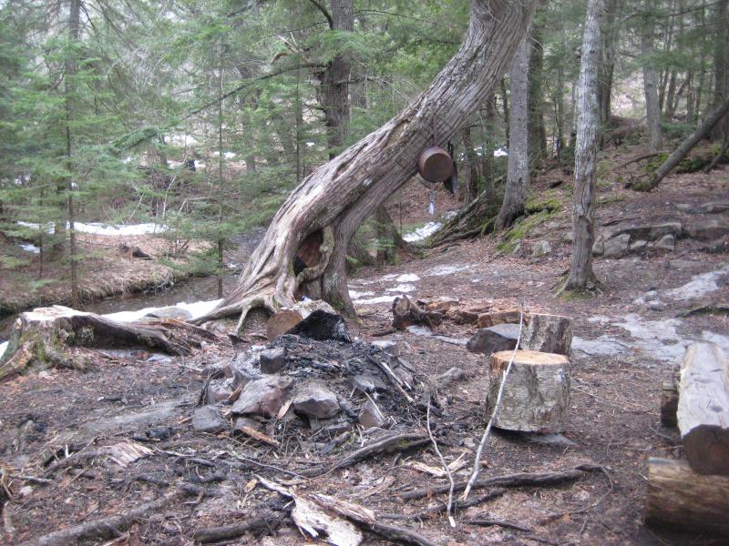 Spring-wet camp above the falls