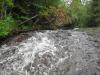 Skidding water over conglomerate rock