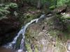 Small, gushing waterfall on Cushman Creek