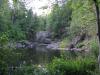 Quiet pool surrounded by impressive outcroppings