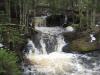 Narrow chute between mossy banks