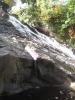 Side view of the cascade beyond the rocky bowl