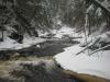 Small drops along the snowy river