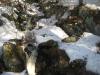 Small narrow chutes between rocks and snow