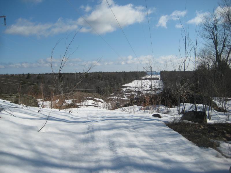 Snowy path down to the lake