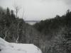Snowy valley reaching to Torch Lake