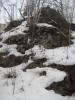 Huge rocky crag above the creek