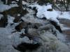 Plenty of water flowing over the blocky rocks