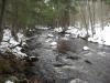 Snow on the banks of the river