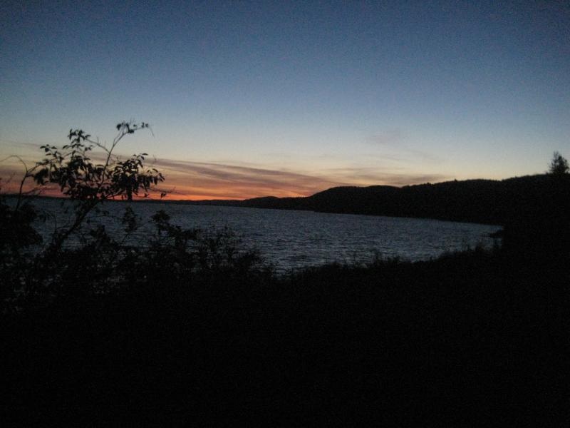 Sunset and dark skies over the lake