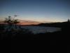 Sunset and dark skies over the lake