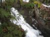 Side view of the gushing waterfall