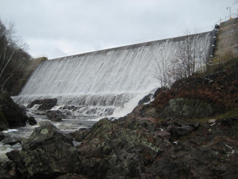 An overflowing dam