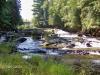 Bright sun over the middle falls