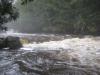 Mist rising above the swollen river