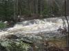 Swollen river finding a way over the rocky riverbed