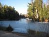 Icy pond across the road