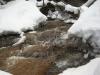 Ice hanging over the creek