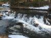 Smooth river above the plunge