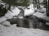 Calm, icy pond