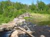 Across the partially dismantled dam