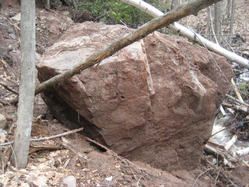 Huge boulder recently dropped here