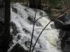 Splashing loudly over the rocks
