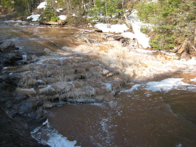 Ice and water over the rock steps