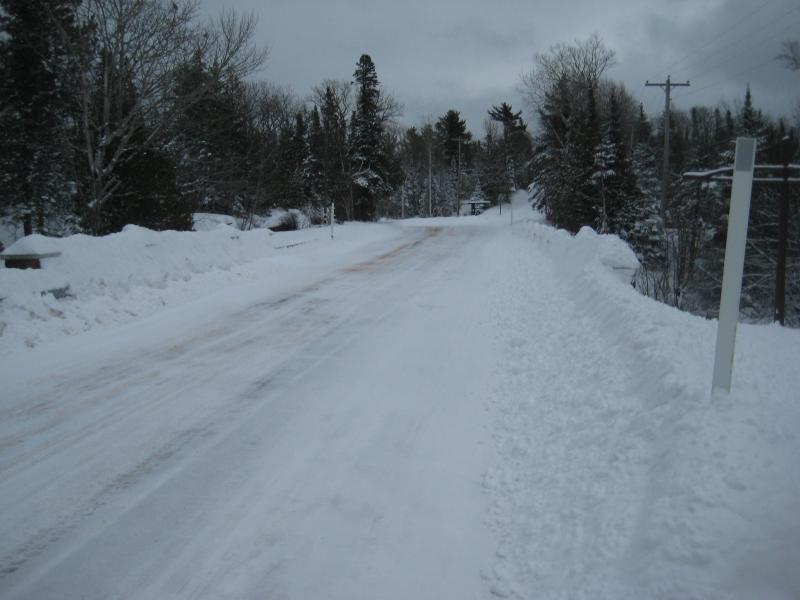 Deep snow pushed off the road
