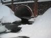 Snowy stone bridge