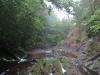 Steep rock wall above the falls