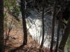 Swollen waterfall far below