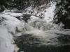Flowing waters bubbling between icy covers