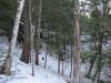Snow covering the steep riverbank