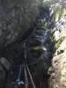 Long chain of chutes between huge rocks