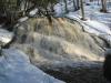 Solid dome of water over rock