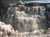 Curtain of raging, frothing water
