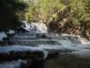 Rushing water over the main waterfall