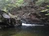 Hidden chute between jagged rocks