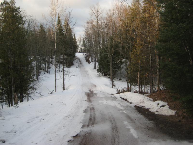 Snow and ice over the old dirt road