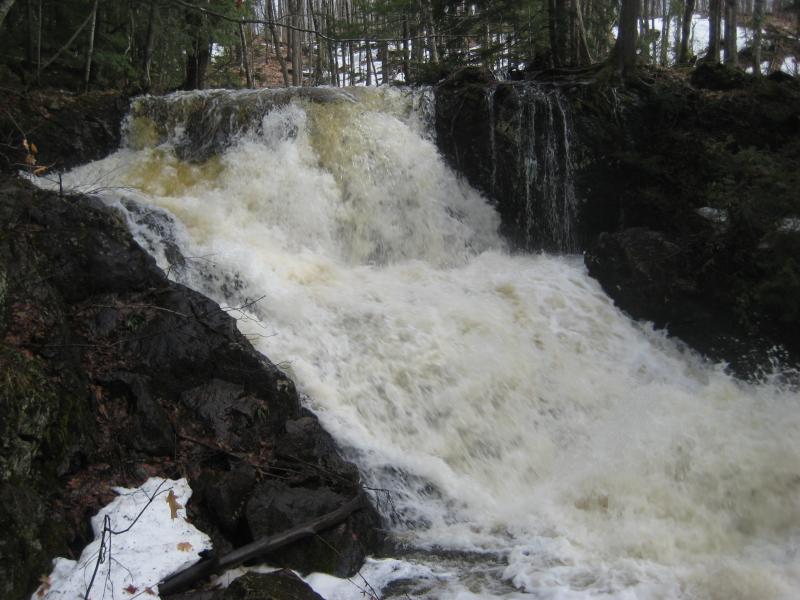 Swelling spring melt over the falls